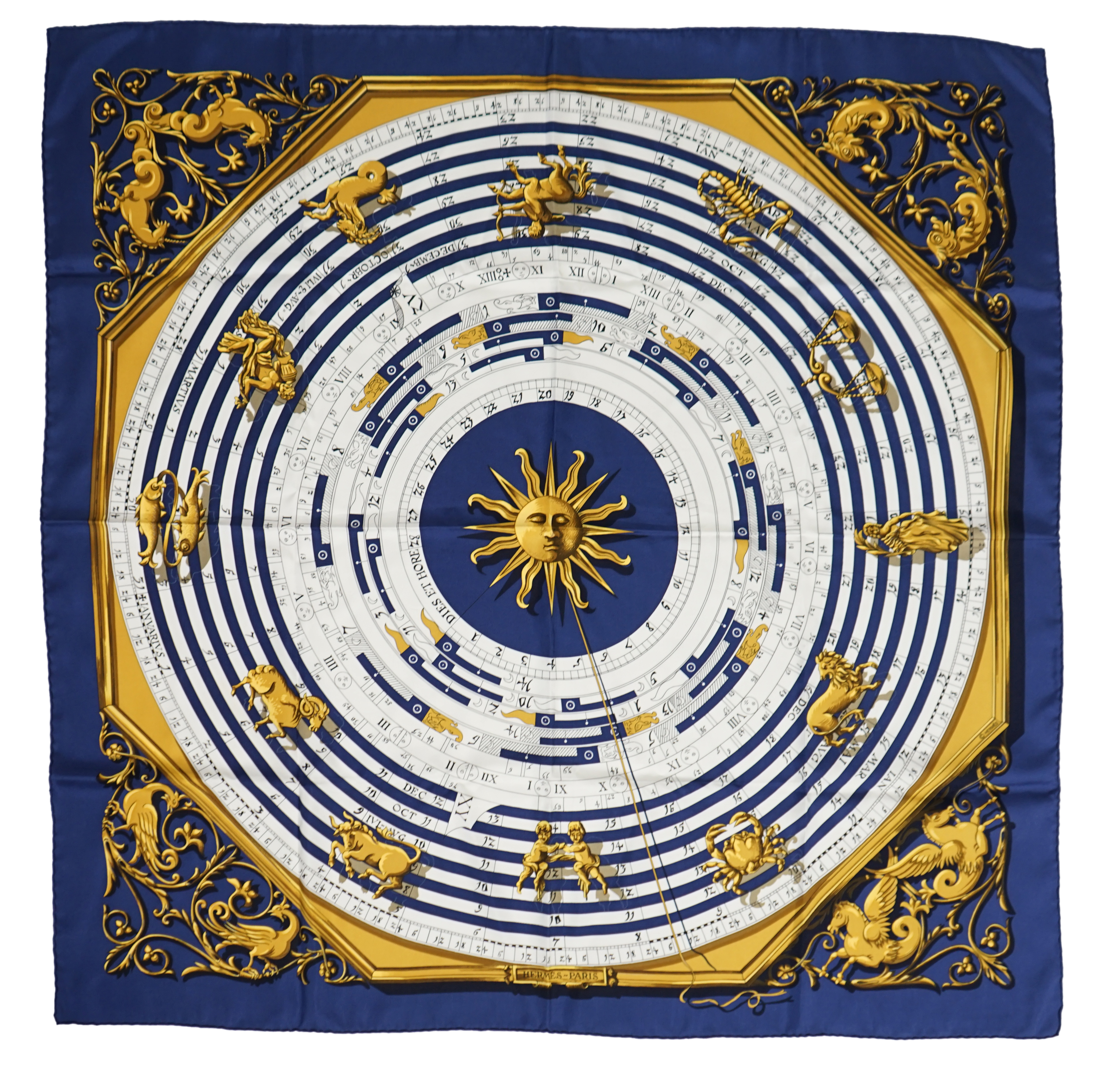 A Hermès Dies et Hore navy silk scarf, 90cm x 90cm